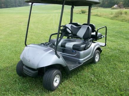 Used 2007 Yamaha Drive Golf Cart 4 Passenger with Striped Seats for sale.
