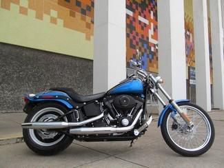 2008 Blue Harley FXSTB Nightrain with custom paint, bars, controls and more.