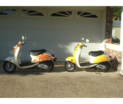 2 Honda Metropolitan Scooters