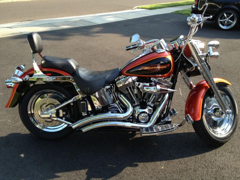 CHROME , CHROME and more CHROME ON THIS 2005 Fat Boy fuel injected