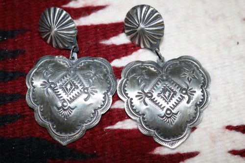 Hand stamped sterling silver heart earrings by vincent