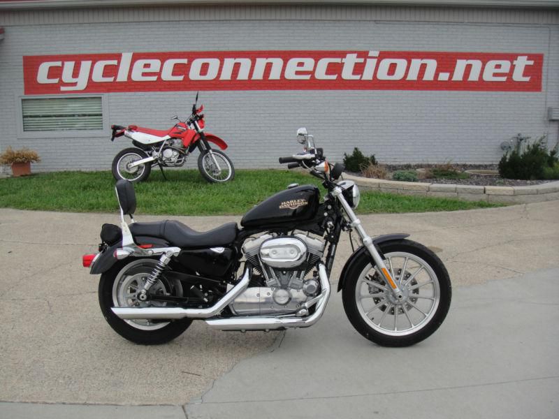2009 Harley Davidson XL883L, Black, 2,964 miles, HD Backrest, Slip on Exhaust