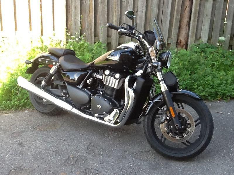 Triumph Thunderbird Storm 2011 with extra chrome and edge windshield